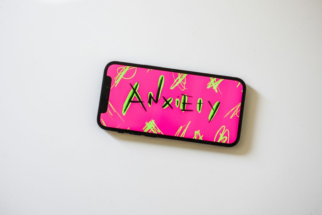 phone displaying the word anxiety
